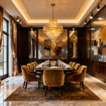 Luxurious dining room featuring a multi-layered lighting design, including a statement chandelier, cove lighting, and accent lights, all contributing to an elegant and warm ambiance with fine dining decor.